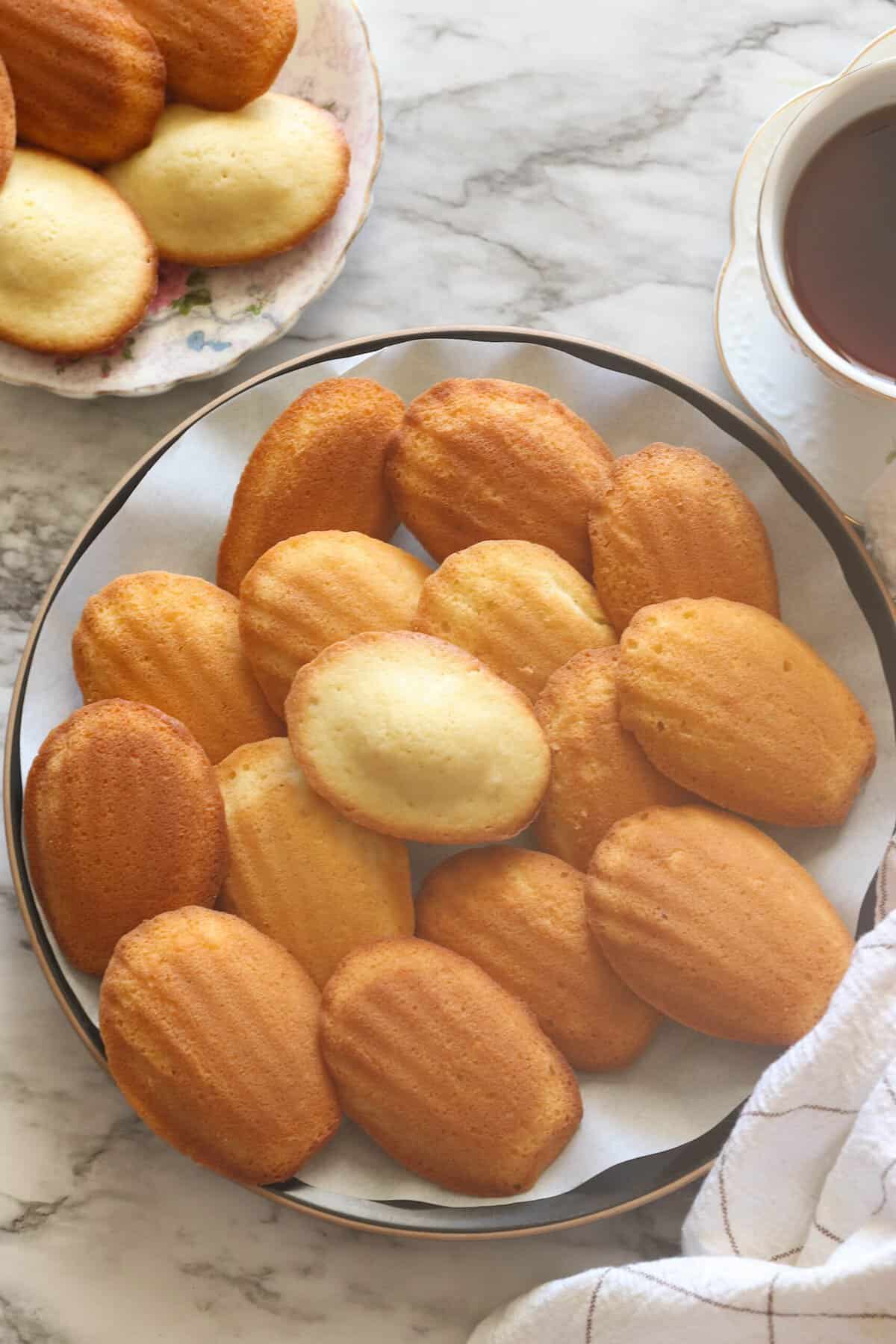 Getting ready to enjoy madeleine cookies with tea or coffee for the perfect snack 