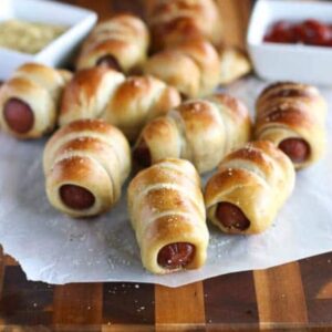 mini hot dogs wrapped in a soft pretzel