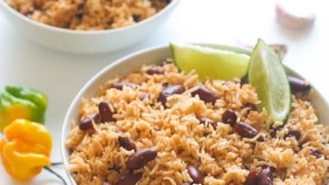 2 bowls of flavored rice with beans and ramped up with freshly squeezed lime