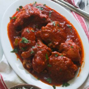 Mouthwatering African Chicken Stew ready to serve with coconut rice