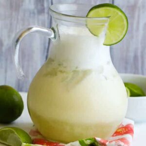 Brazilian lemonade with condensed milk and limes for a refreshing tropical drink