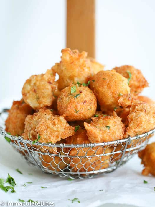 Saltfish Fritters in a wire basket 