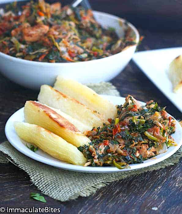 Serving up stewed greens with yuca fries