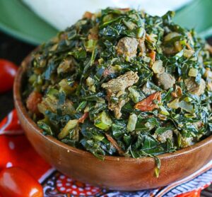 Serving up a delectable bowl of sukuma wiki (African collard greens) with ugali or fufu