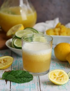 Serving up a glass of Pineapple Lemonade decorated with mint leaves