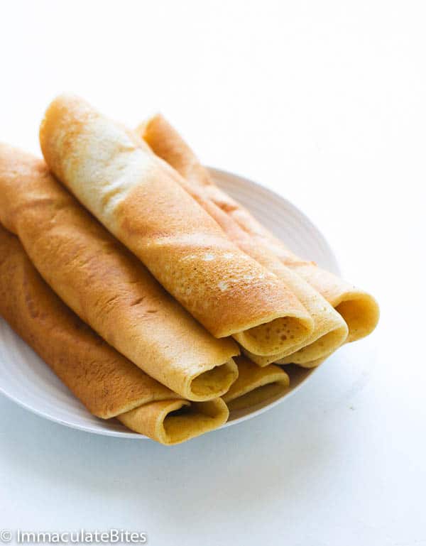 Rolled Injera on a White Plate