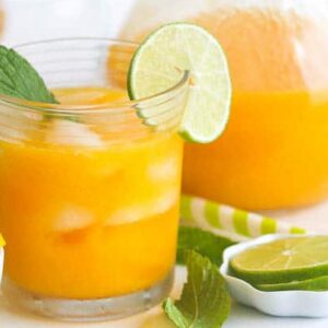 A pitcher of insanely delicious mango lemonade for a refreshing treat
