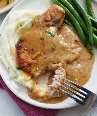 Easy Smothered Pork Chops - Immaculate Bites