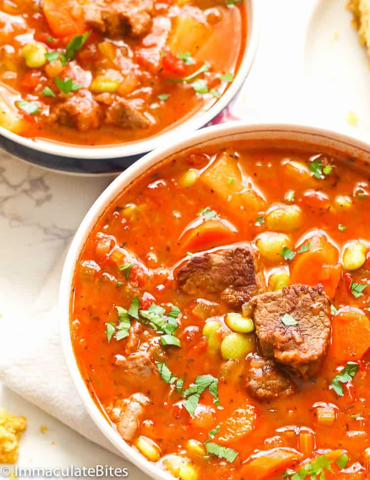 Digging into a bowl of beefy vegetable soup