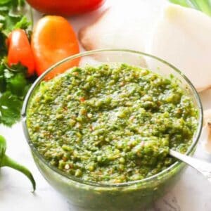 Sofrito with fresh ingredients in the background