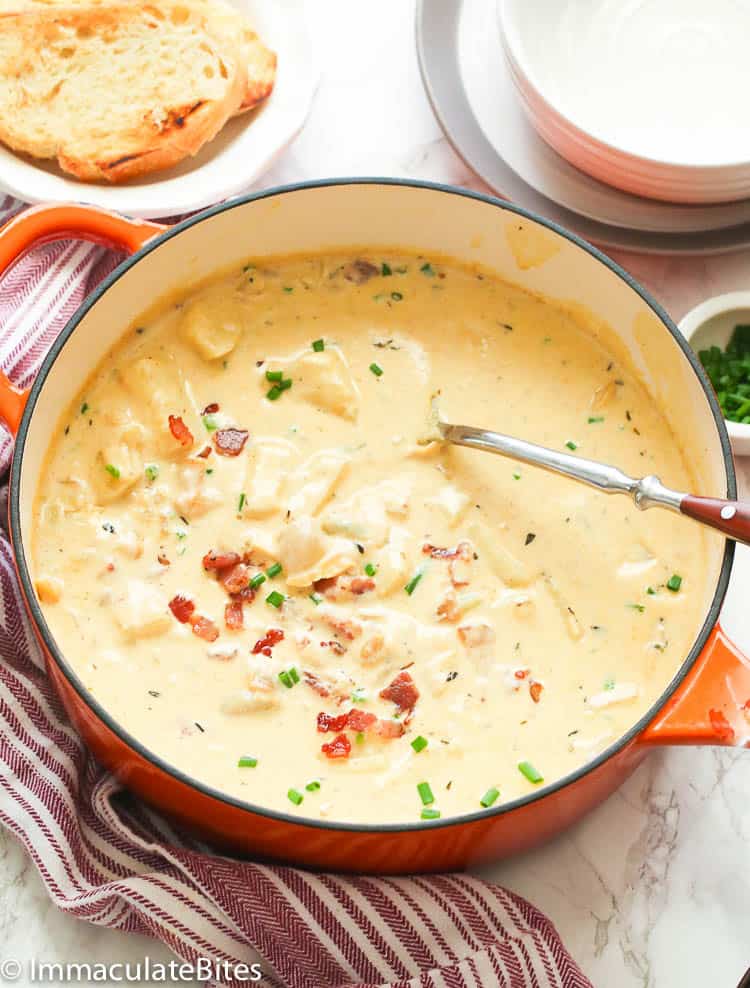 New England Clam Chowder fresh off the stove and ready to serve with crusty bread