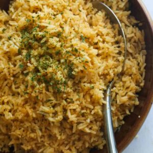 Herb-infused rice on a bowl