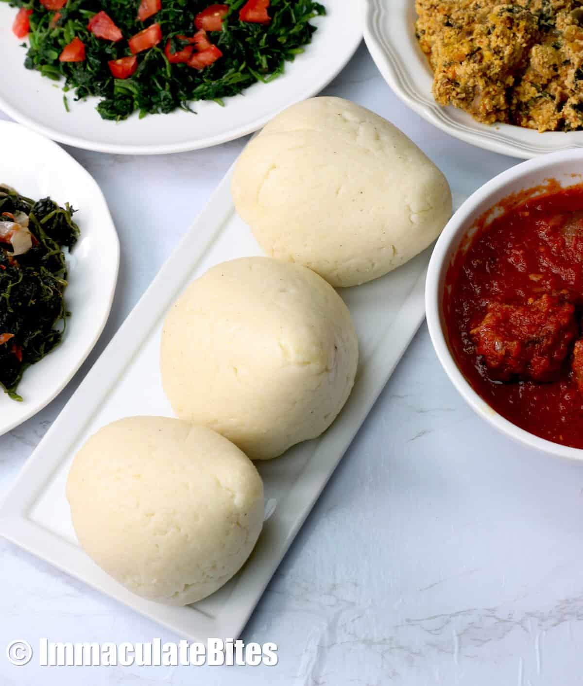 Satisfying Ugali (corn fufu) with traditional African dishes