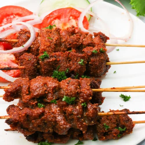 https://www.africanbites.com/wp-content/uploads/2022/03/a-plate-of-stacked-suya-beef-copy-500x500.jpg