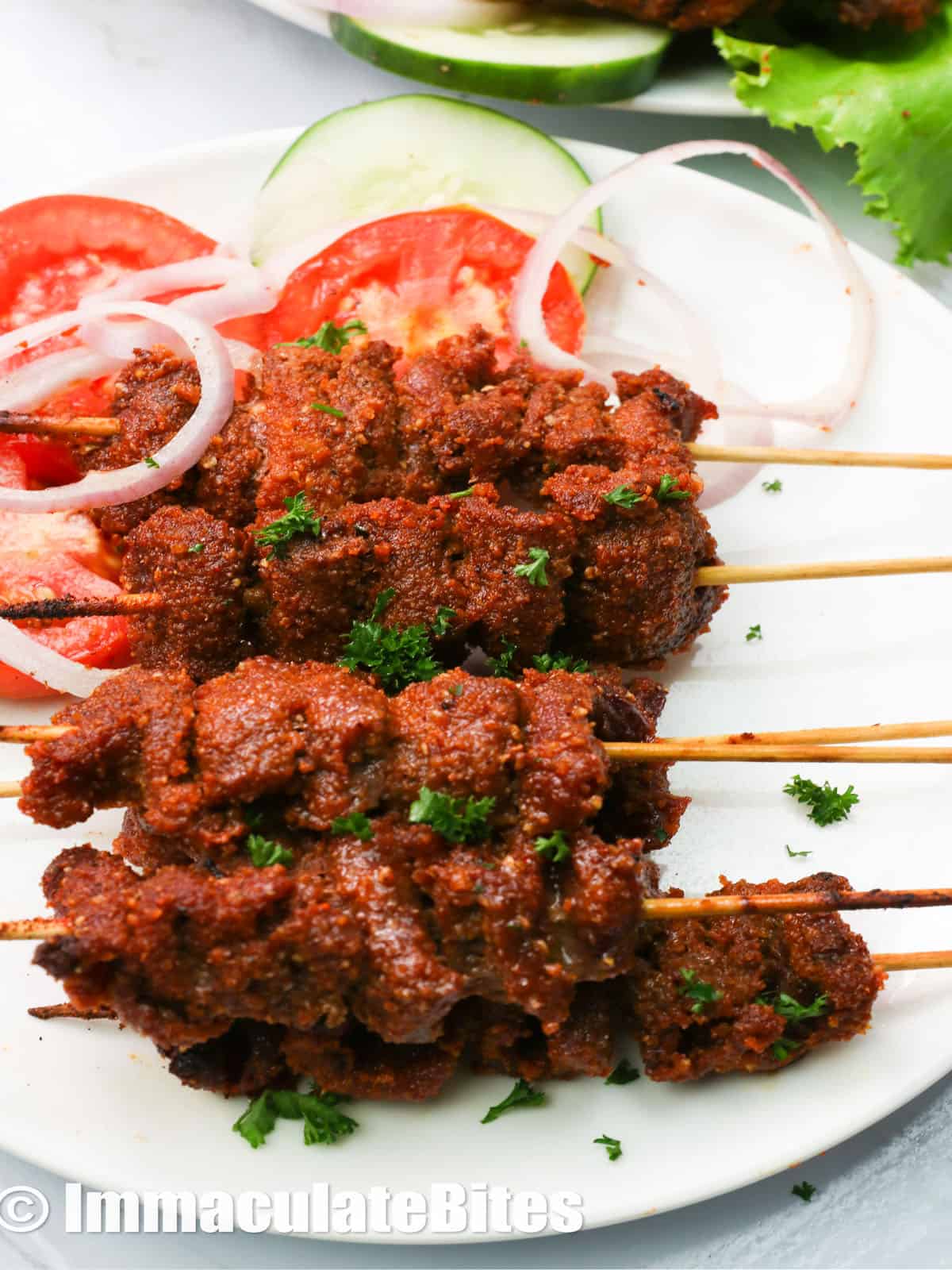 https://www.africanbites.com/wp-content/uploads/2022/03/a-plate-of-stacked-suya-beef-copy.jpg