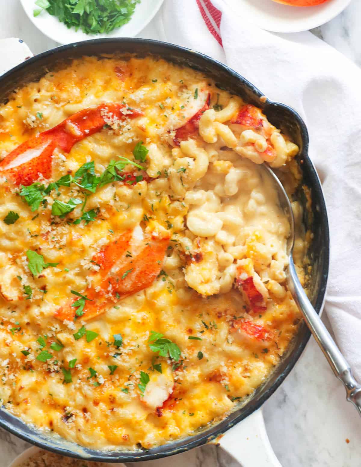 Lobster mac and cheese ready to put a spoon in a bowl