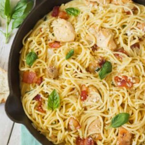 Mouthwatering chicken carbonara in a skillet ready to serve.