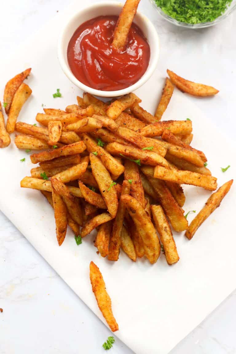 Crispy Cajun Fries Recipe - Immaculate Bites