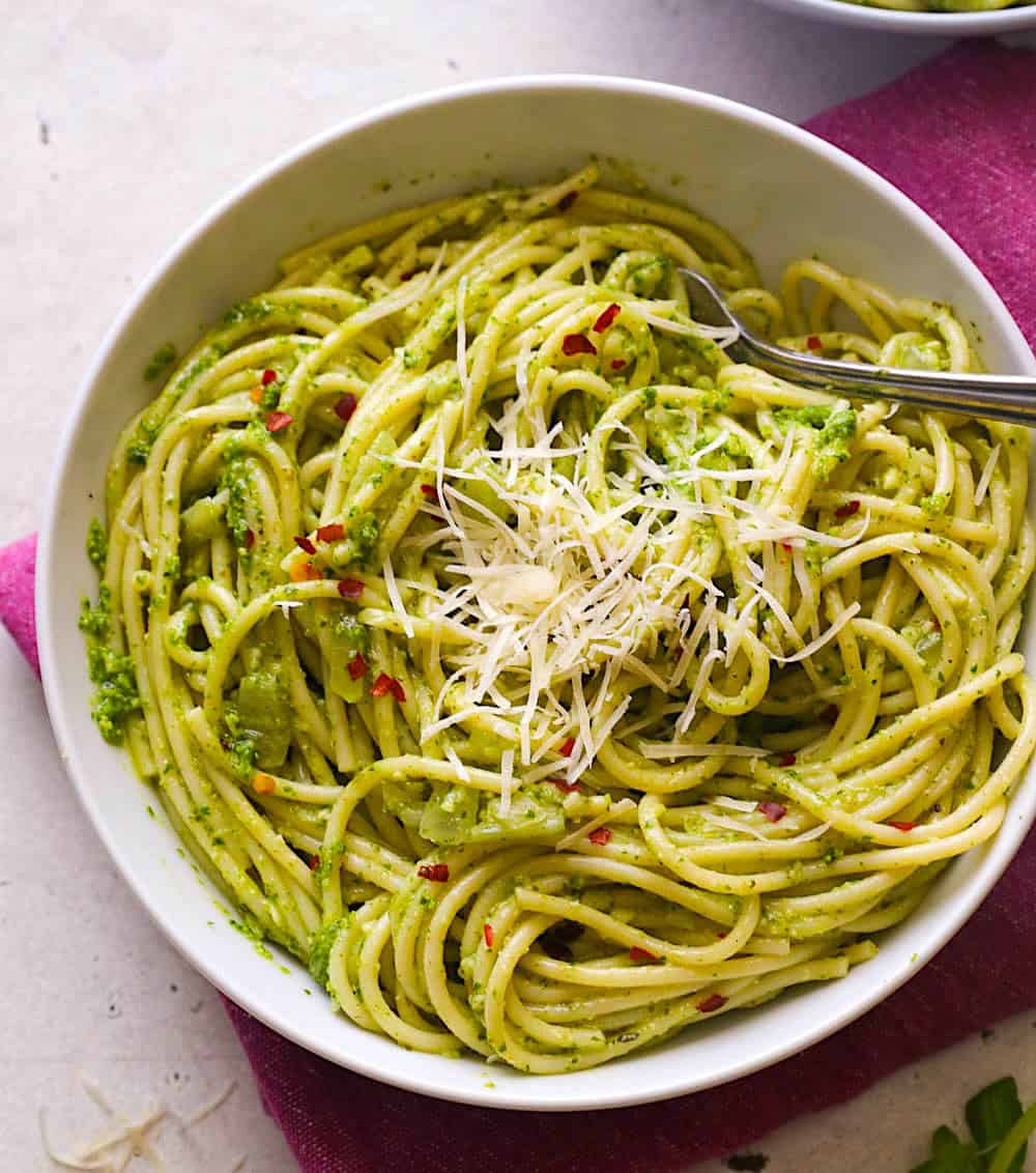 Ridiculously good pesto pasta topped with freshly grated parmesan