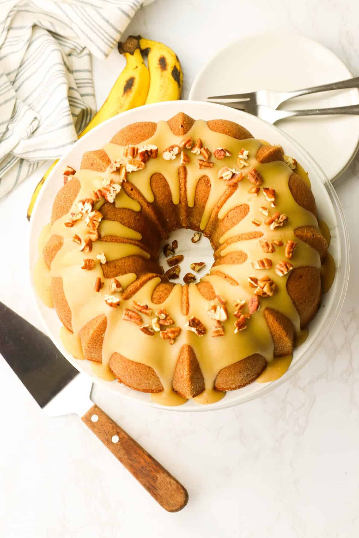 A gorgeous and insanely comforting banana bundt cake with salted caramel glaze