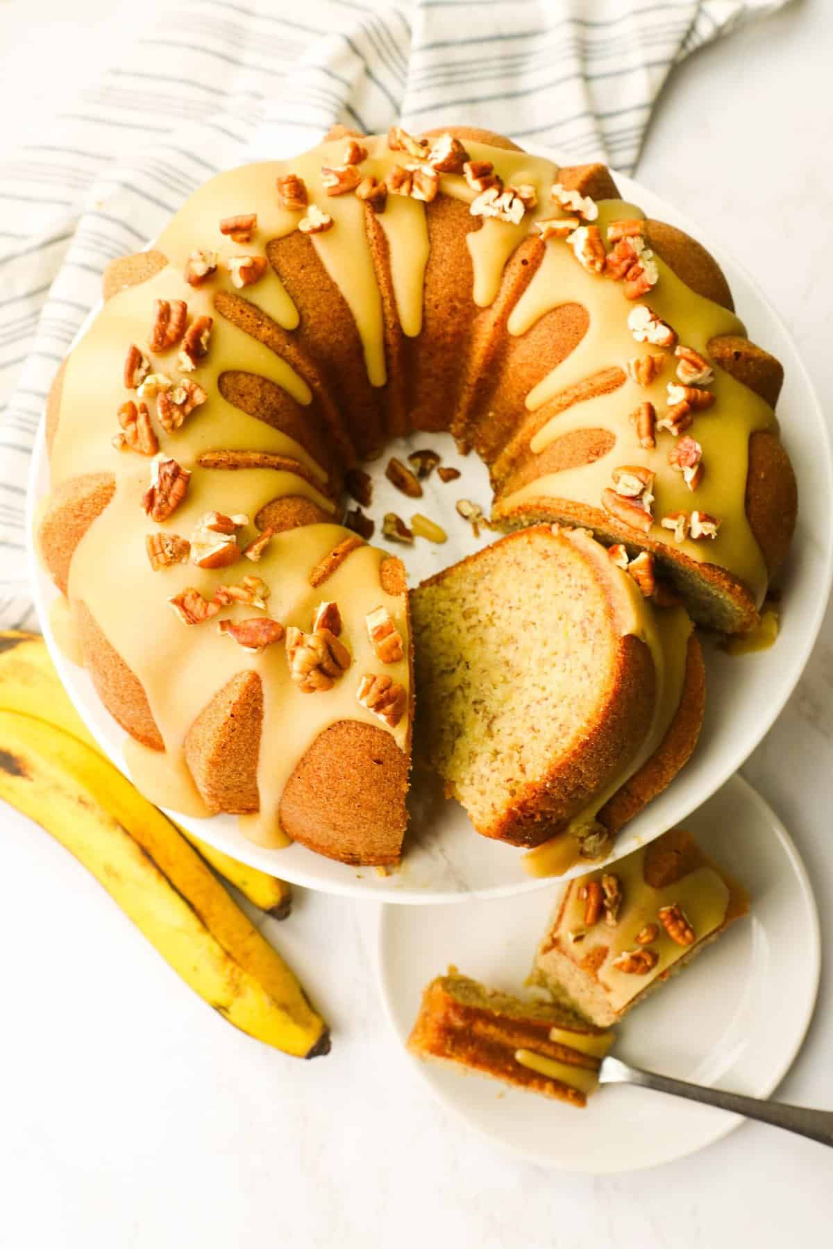 Slicing up a freshly made banana bundt cake