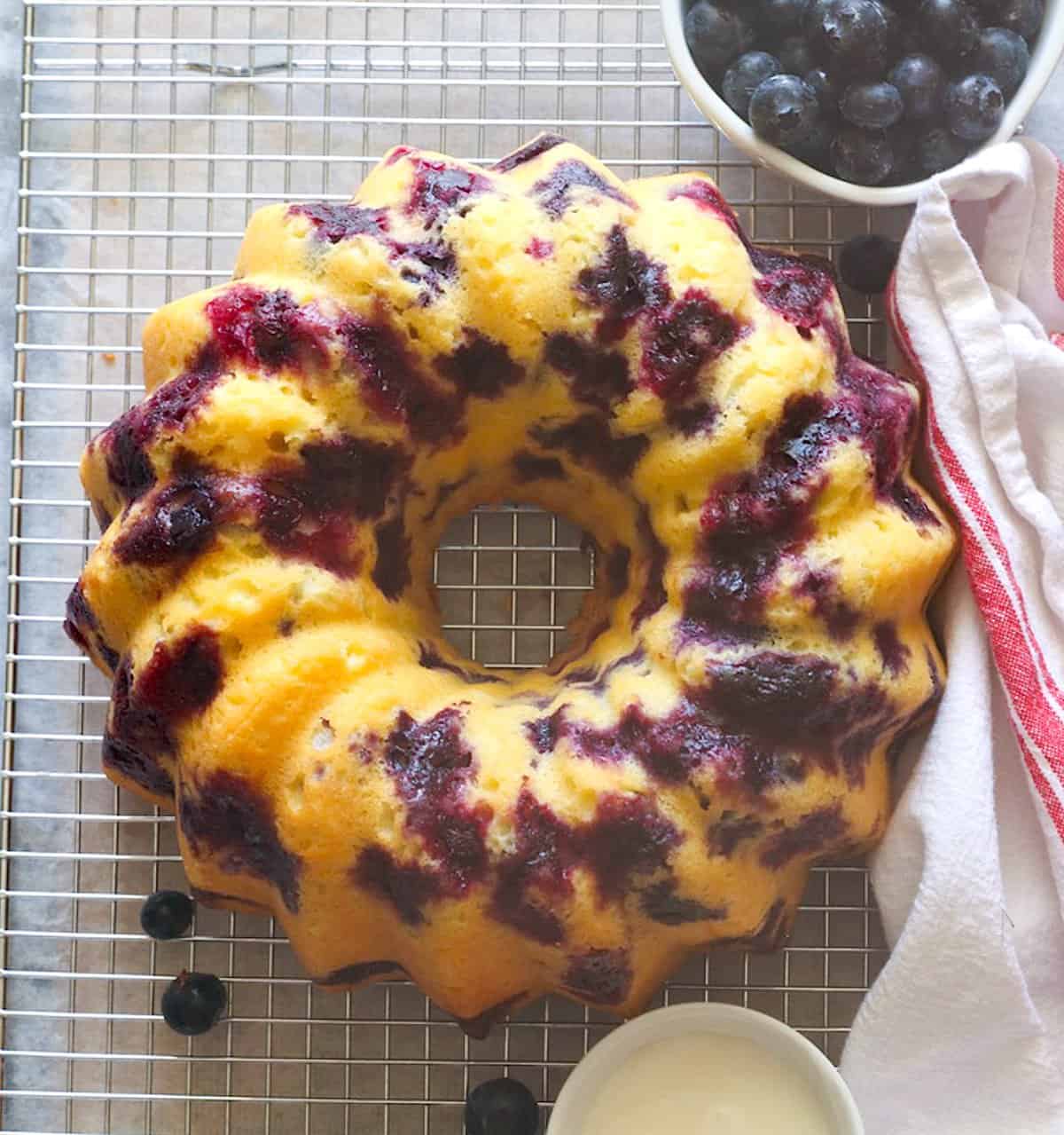 A finished blueberry bundt cake ready to glaze and enjoy