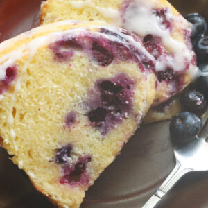 Enjoying a bite of moist, tender blueberry bundt cake
