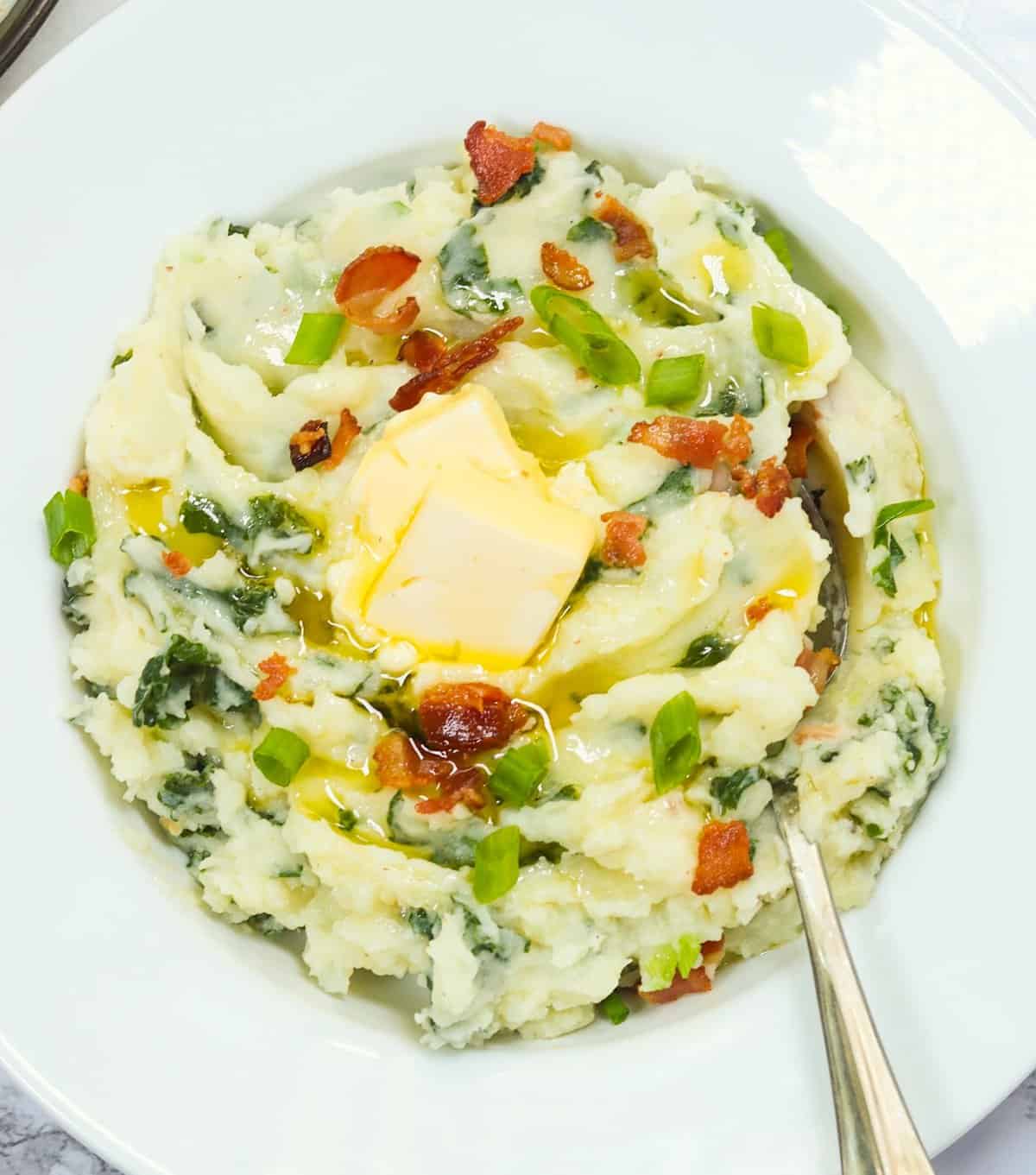 Enjoying a bowl of satisfying colcannon potatoes loaded with butter and bacon