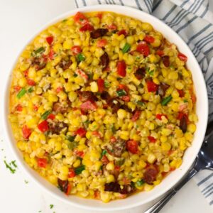 A steaming hot pan of corn maque choux ready to enjoy