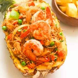 Delicious pineapple fried rice in a hollowed out pineapple