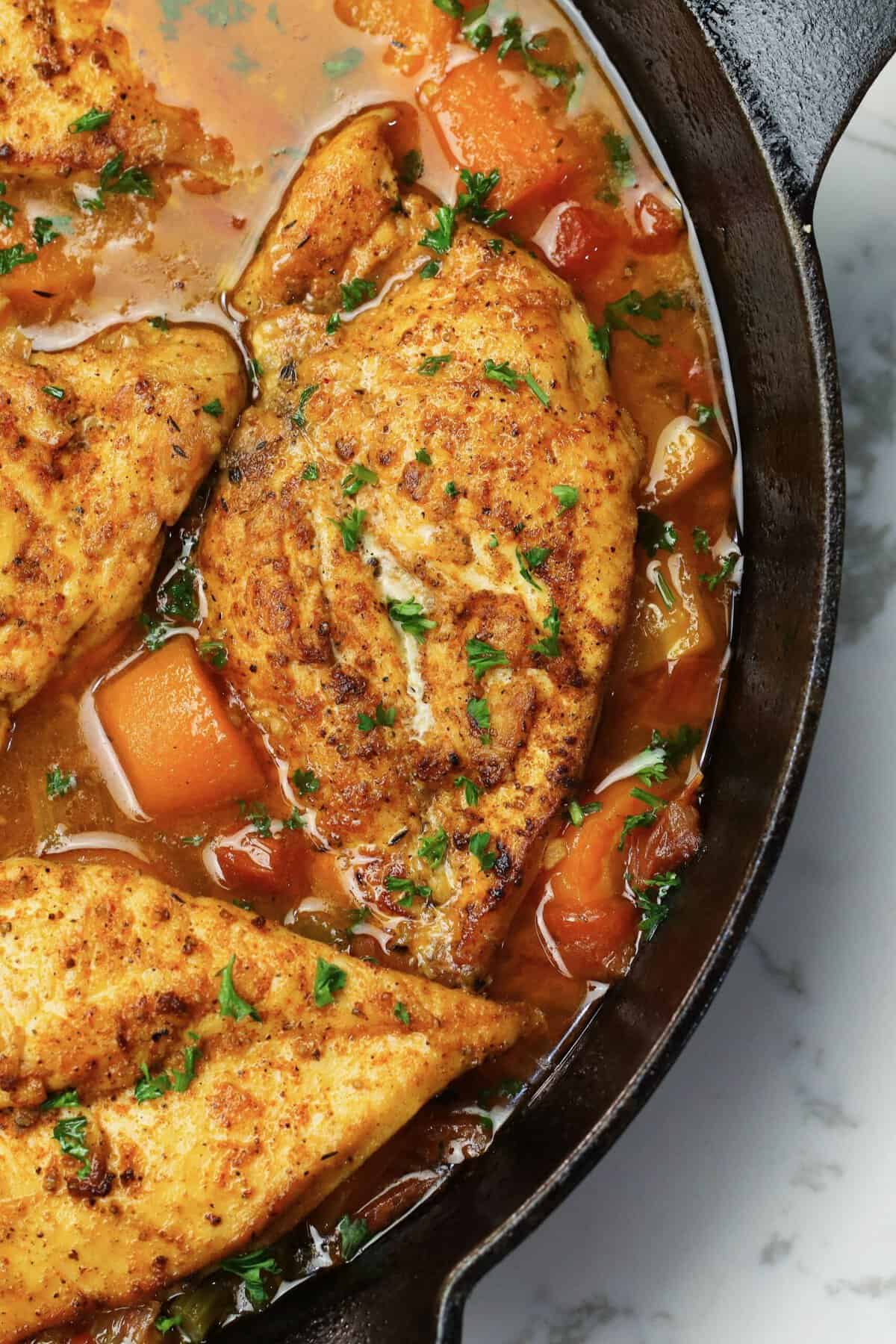 Ridiculously tender and juicy braised chicken breasts fresh from the oven 