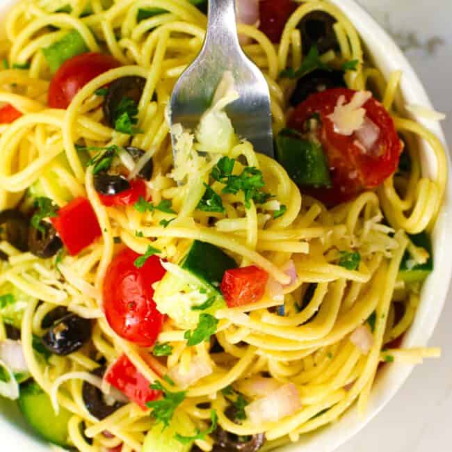 Diving into an insanely delicious California spaghetti salad with a fork