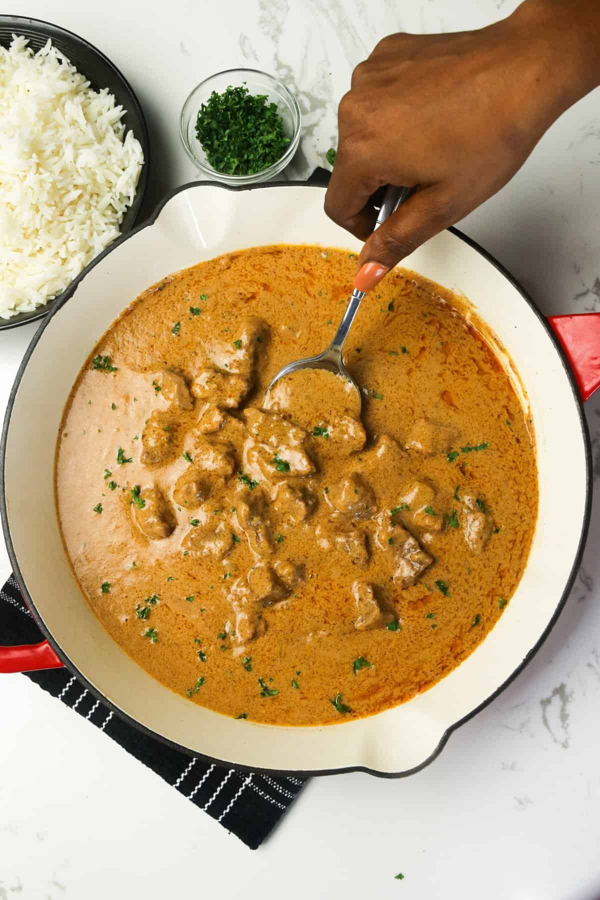 Serving hot from the stove homemade African peanut soup 