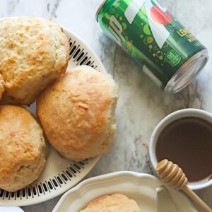 Enjoying 7UP biscuits with butter and honey