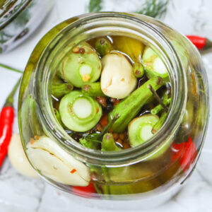 Popping open a jar of quick pickled okra