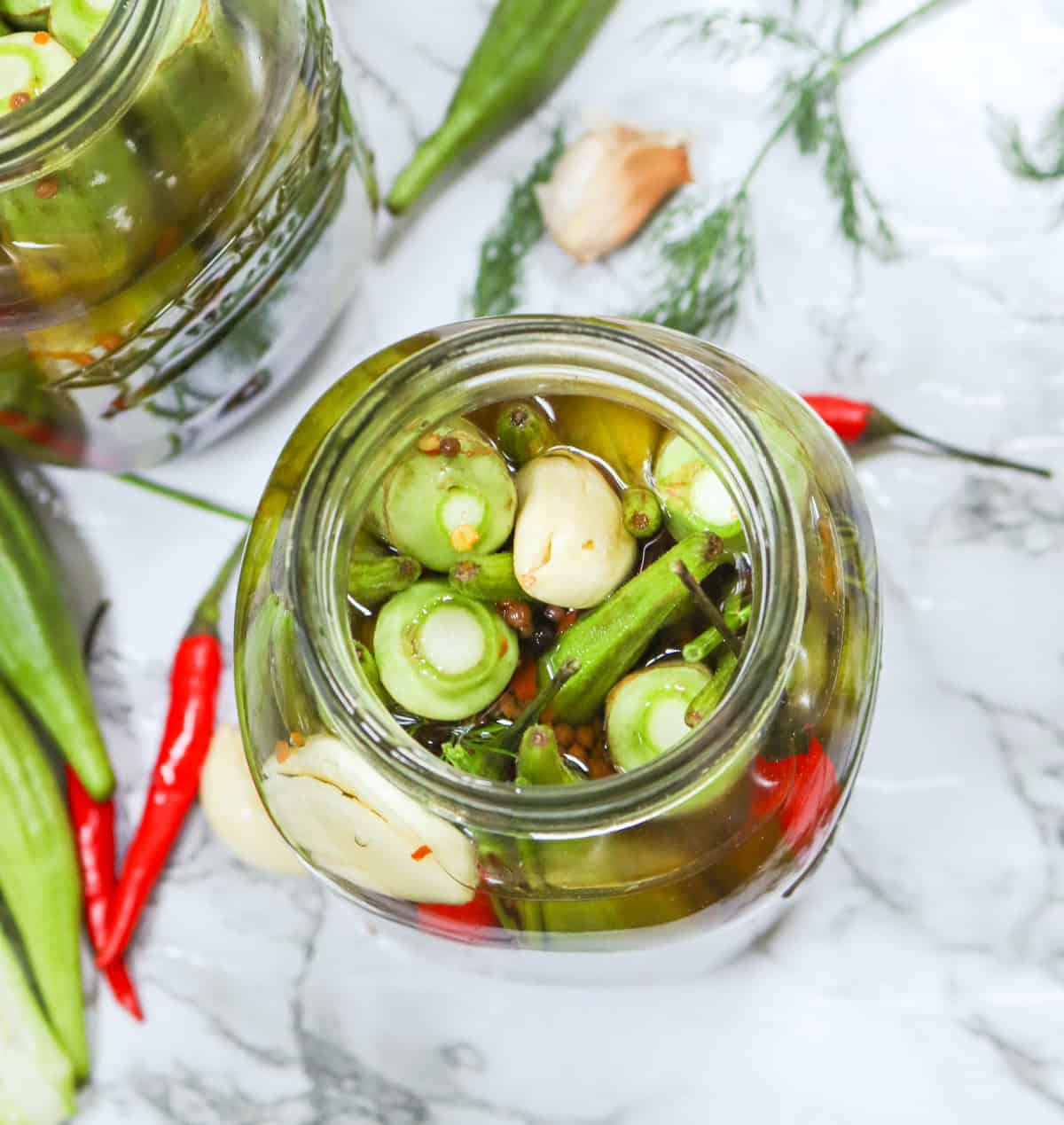 Popping open a jar of quick pickled okra