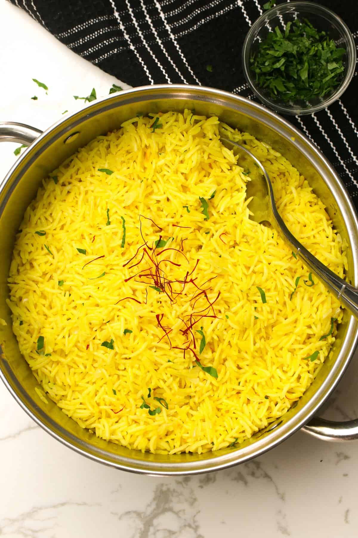 Freshly cooked saffron rice ready to serve up