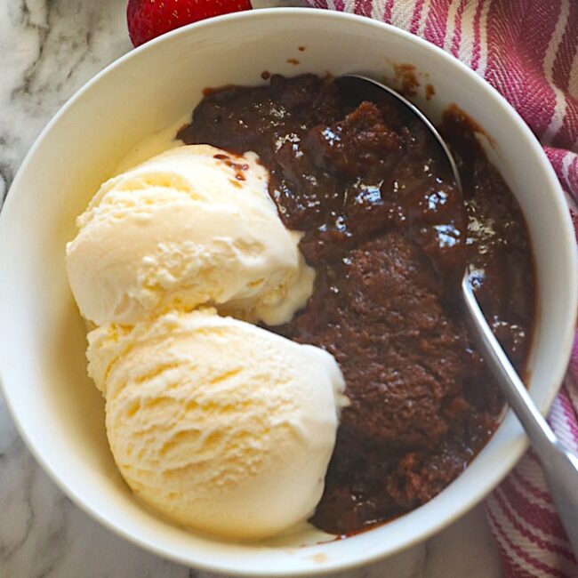 Serving up warm chocolate cobbler with vanilla ice cream