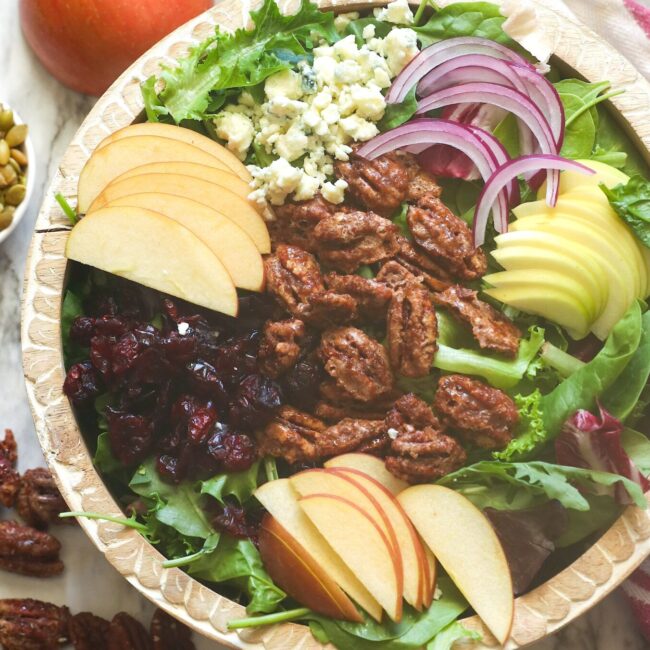 Getting ready to dress a perfectly balanced apple pecan salad