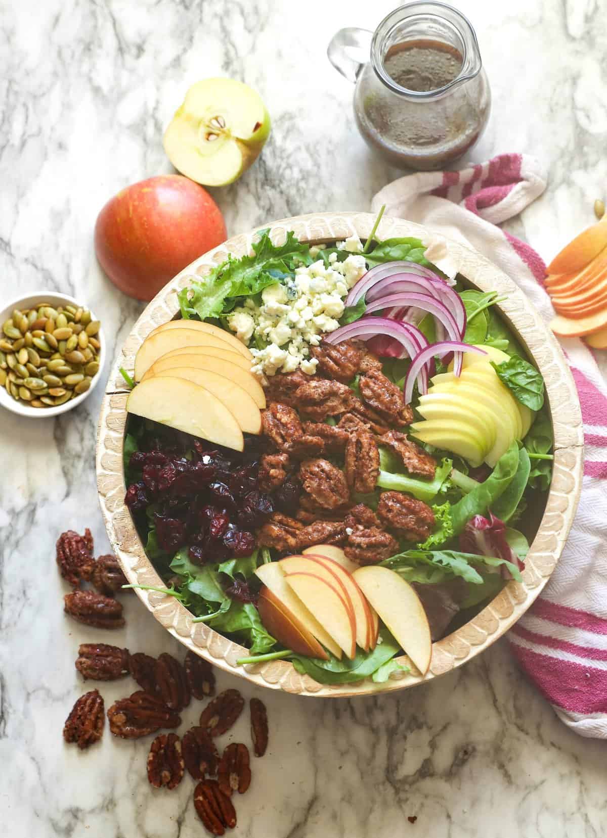 Getting ready to dress a perfectly balanced apple pecan salad