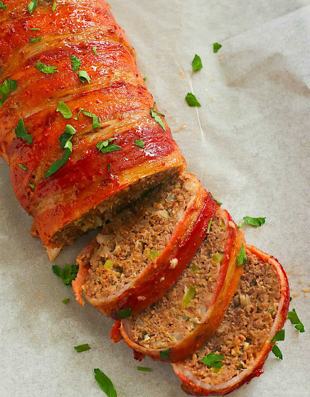 Slicing into a freshly baked and rested meatlover's dream meatloaf