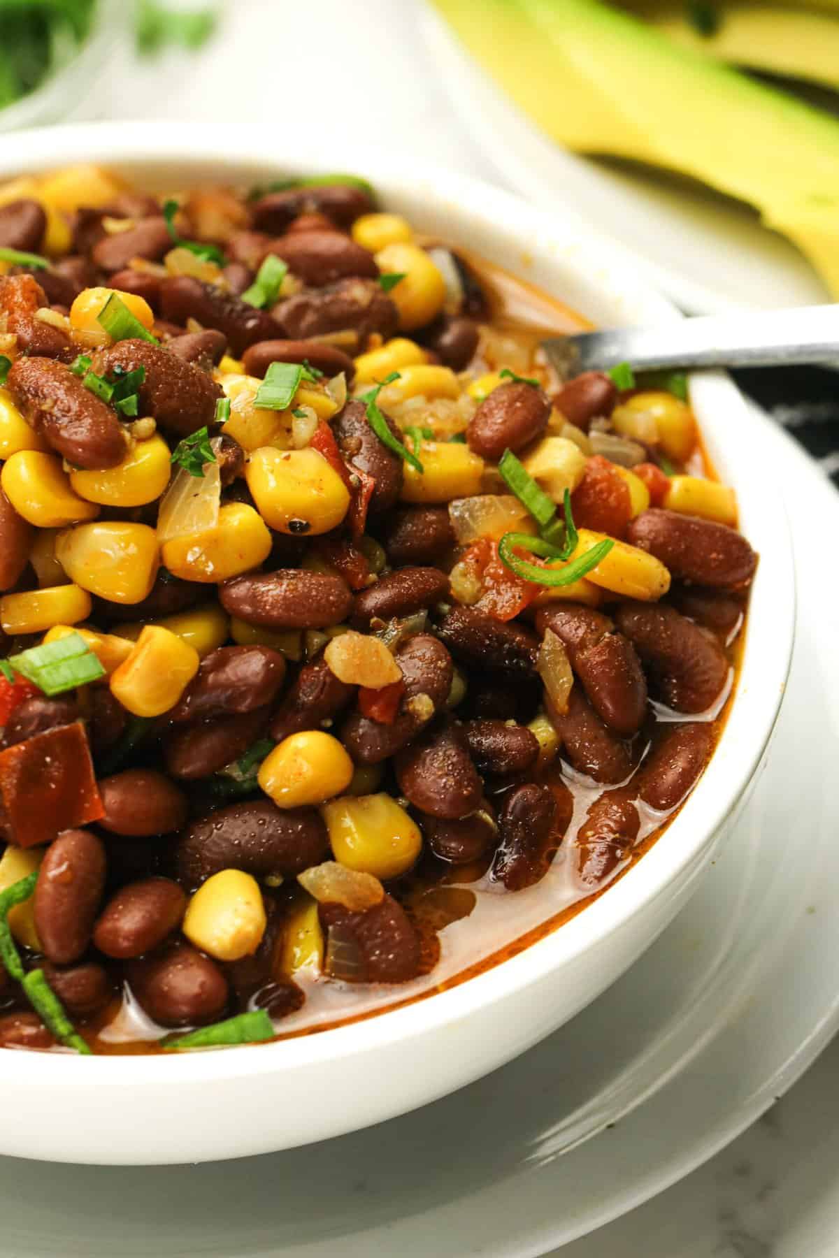 Digging into a bowl of insanely good githeri for a nutritious plant-based meal