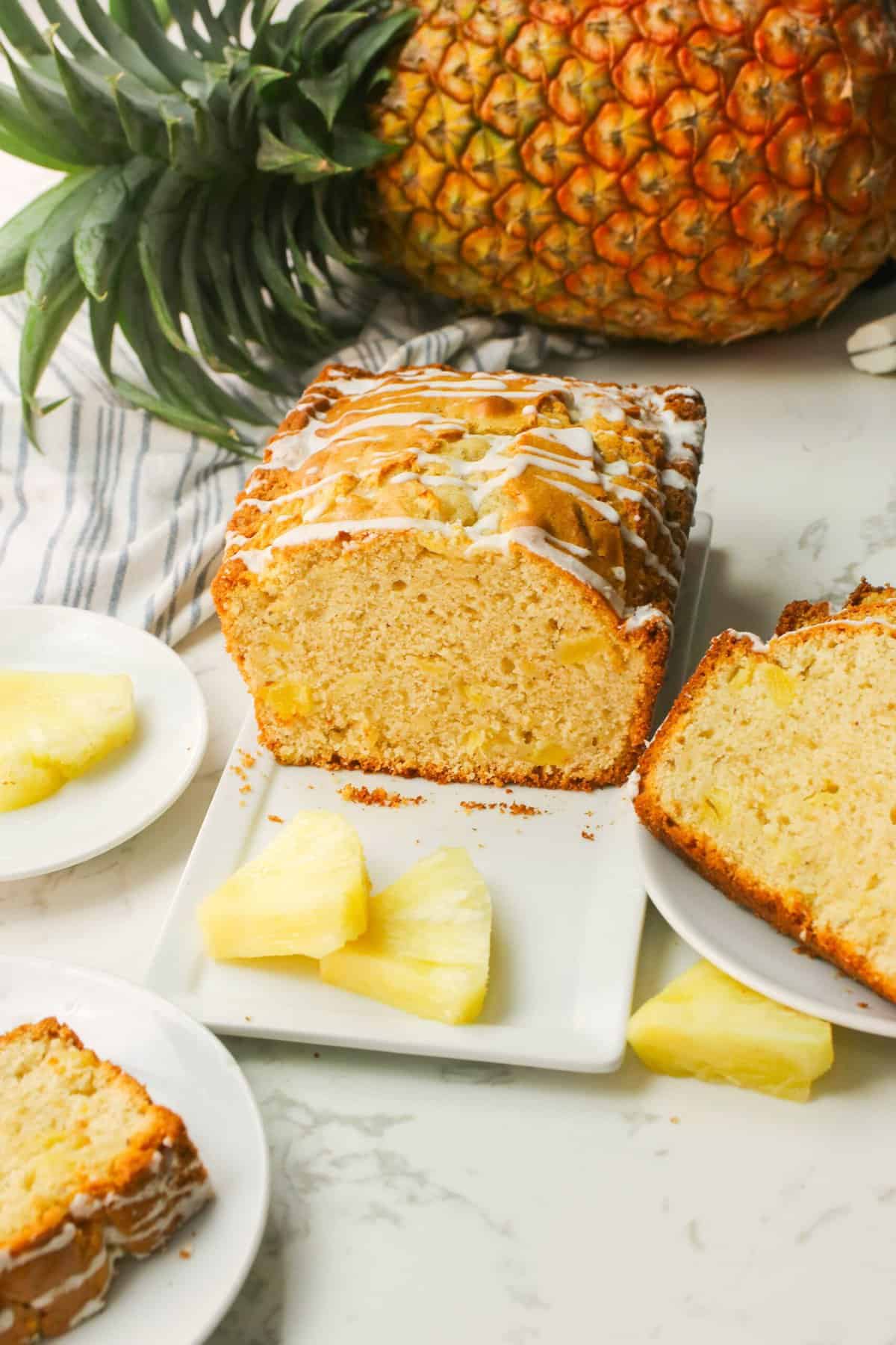 Enjoying slices of fresh pineapple with beautifully glazed bread