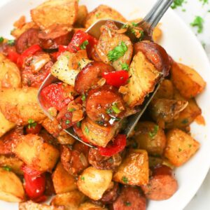 Enjoying sausage and potatoes hot off the stove