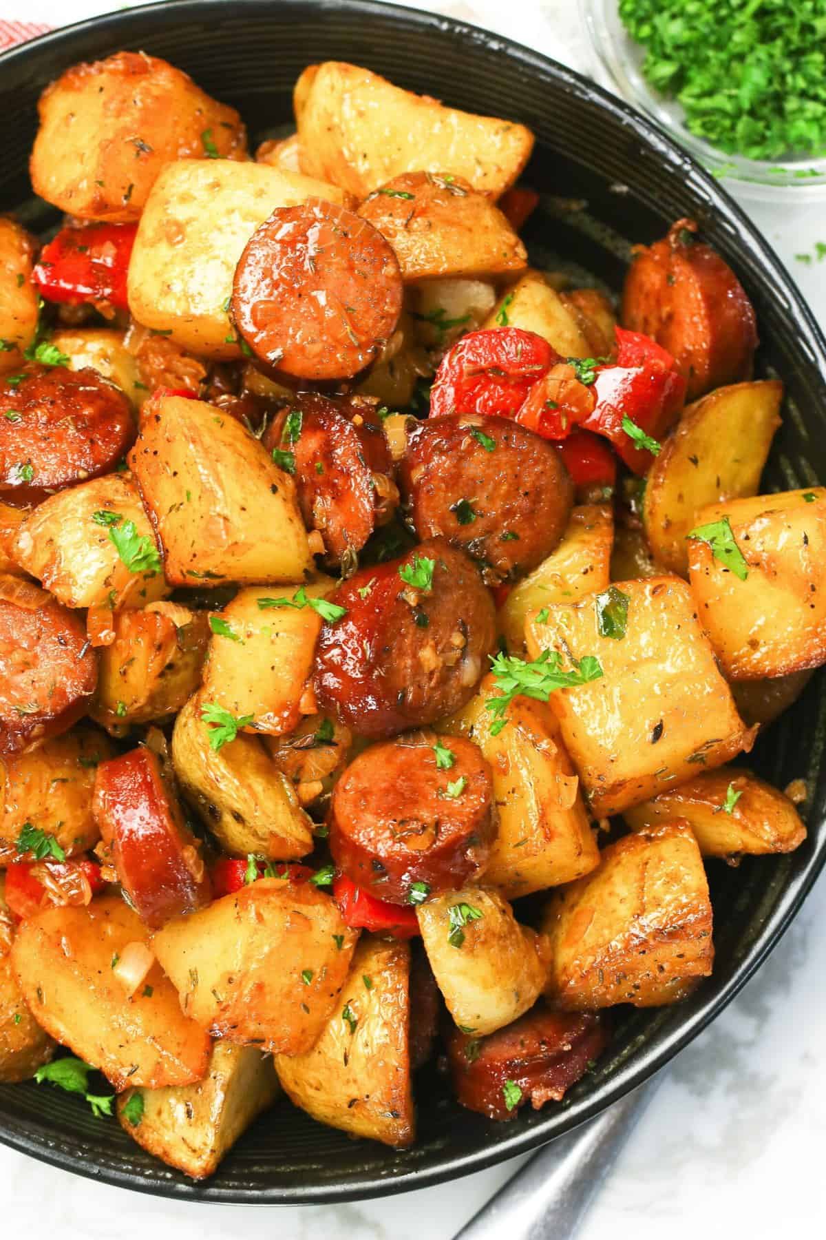 Enjoying comfort food with the family in the form of sausage and potatoes