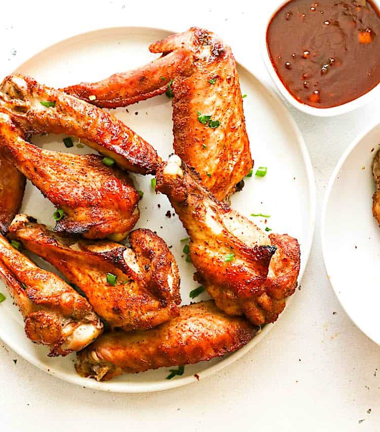 Oven baked turkey wings ready to enjoy with an insanely good sauce