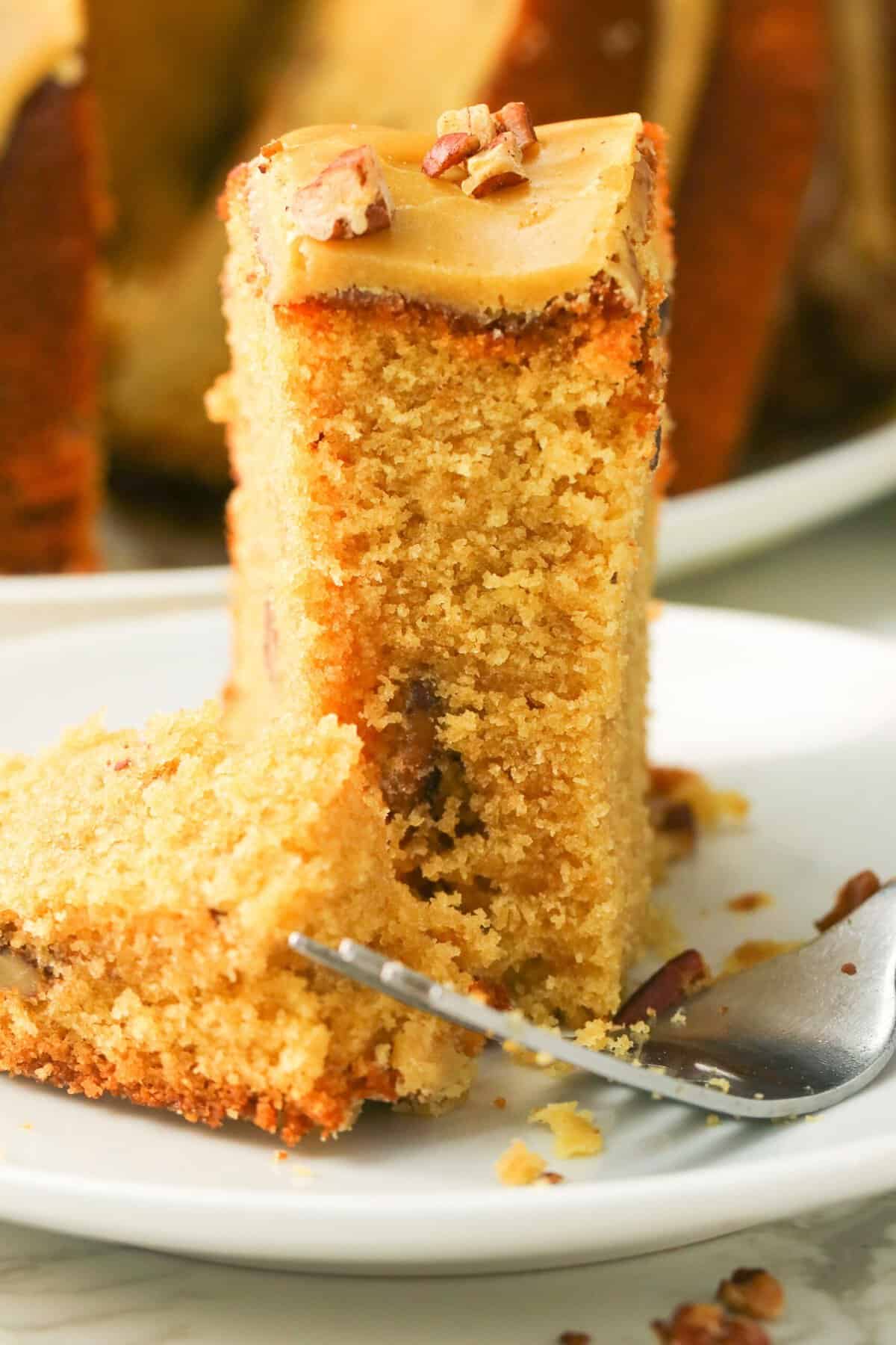 Forking into a decadent slice of brown sugar pound cake with caramel glaze