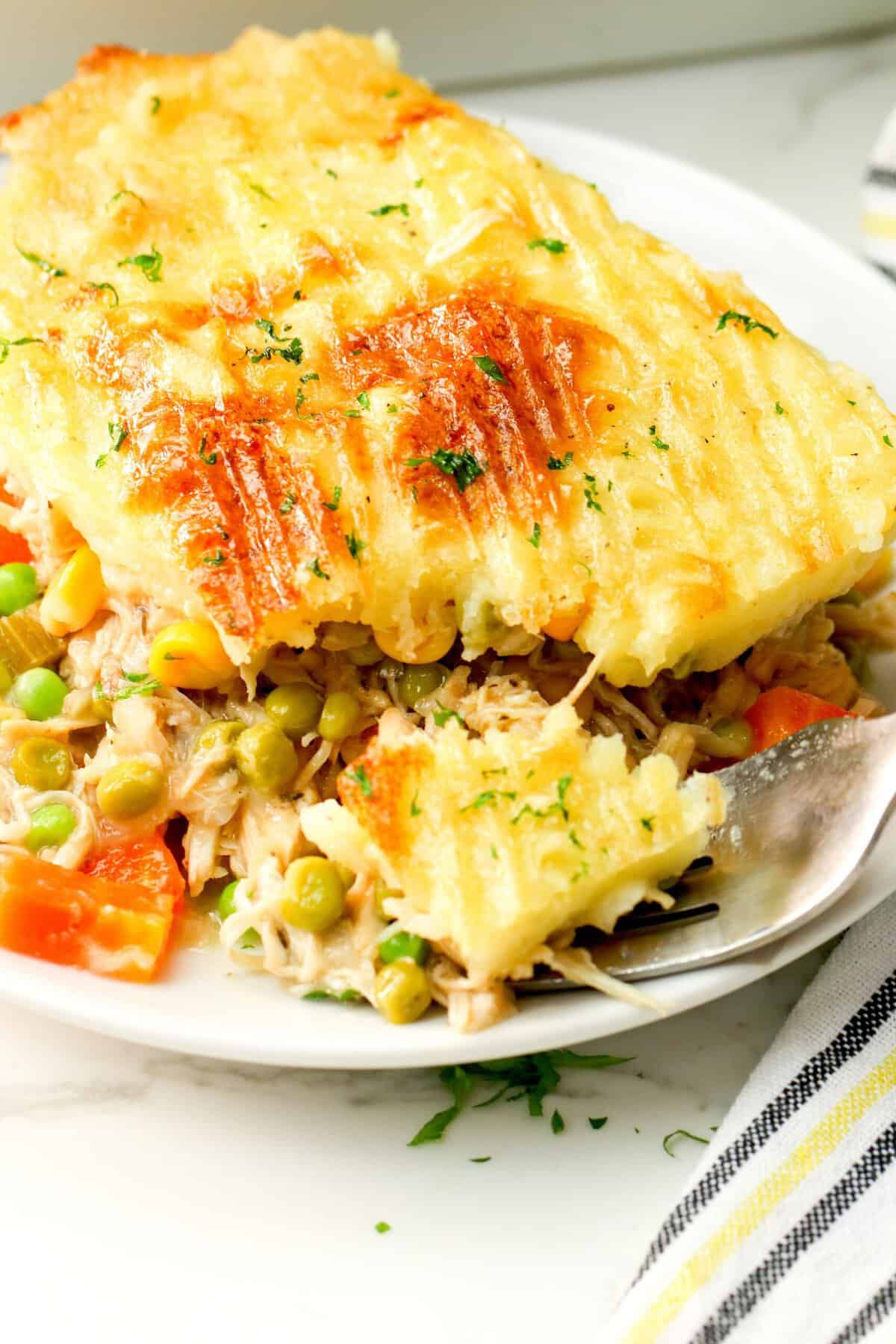 Eating crazy delicious chicken shepherd's pie with a fork