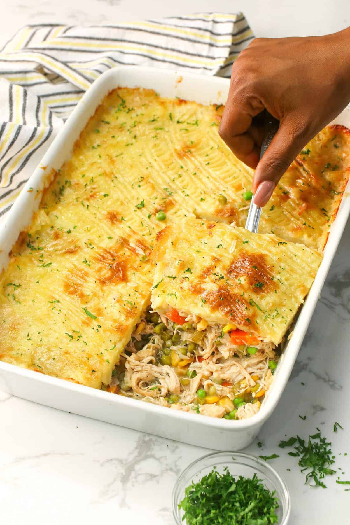 Serve piping hot chicken shepherd's pie to a happy family