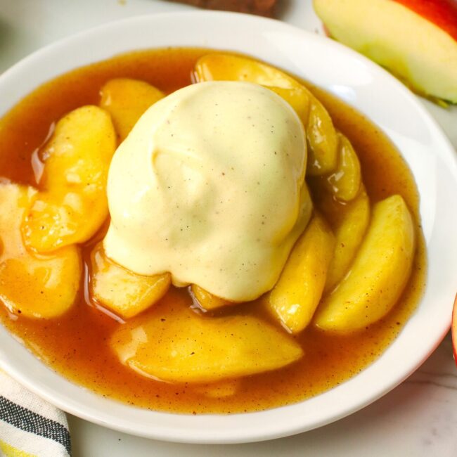 Serving warm fried apples with a scoop of vanilla ice cream for a comfort food dessert